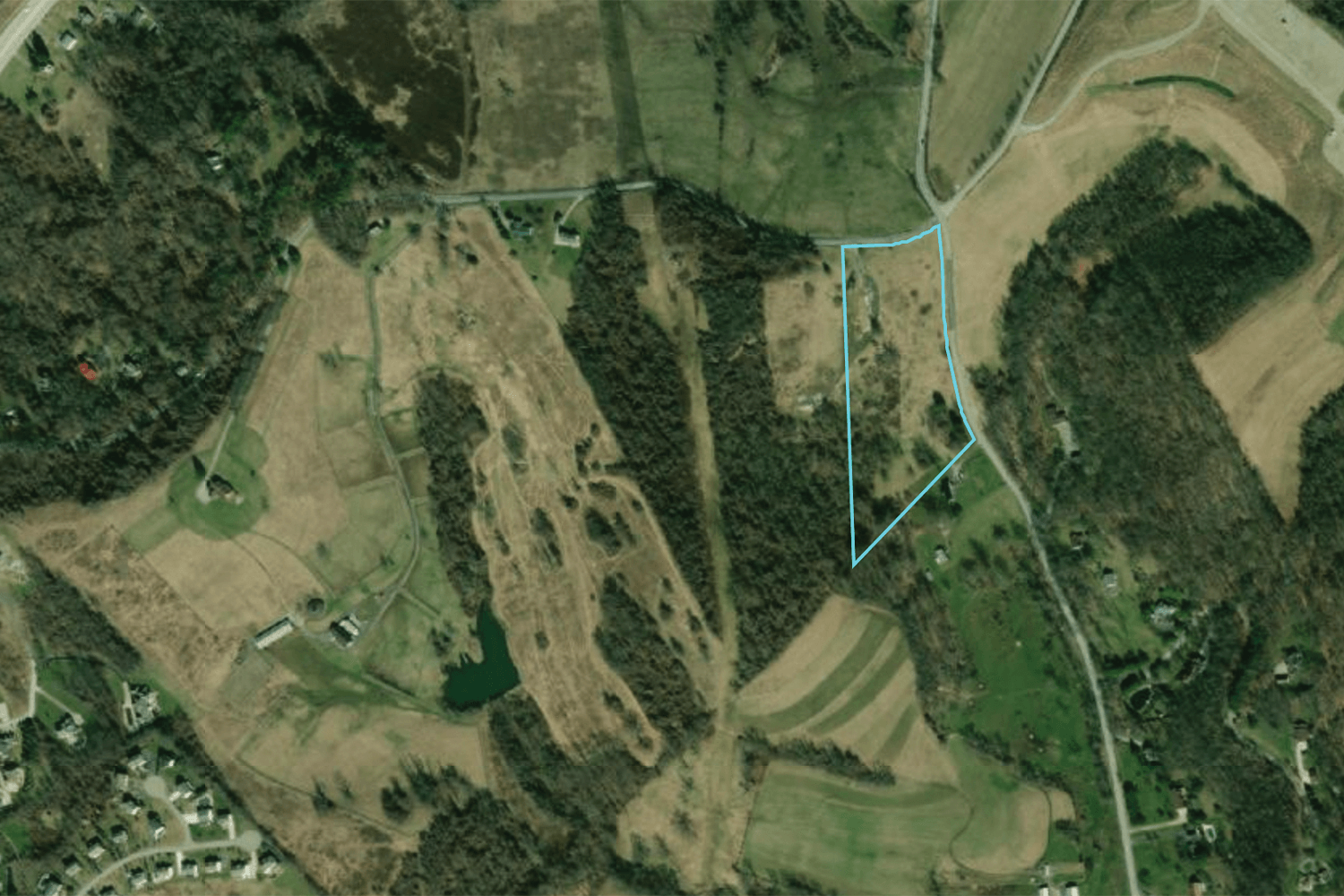 Aerial view of 550 Munce Ridge Road with an outline of property lines