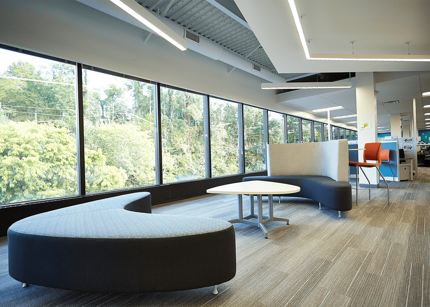 Collaborative workspace with modern abstract couches and table