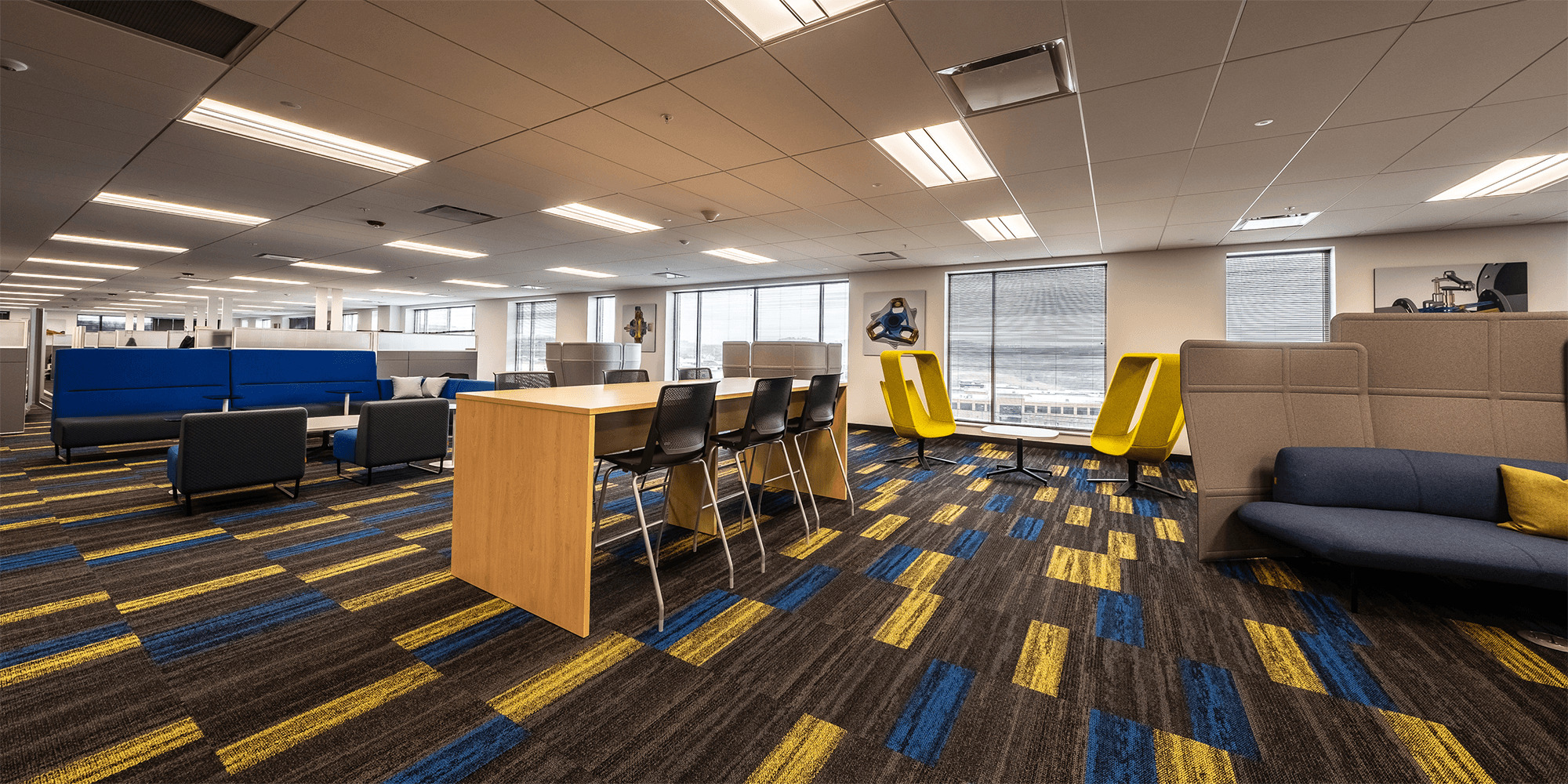 large open office space bright colored furniture