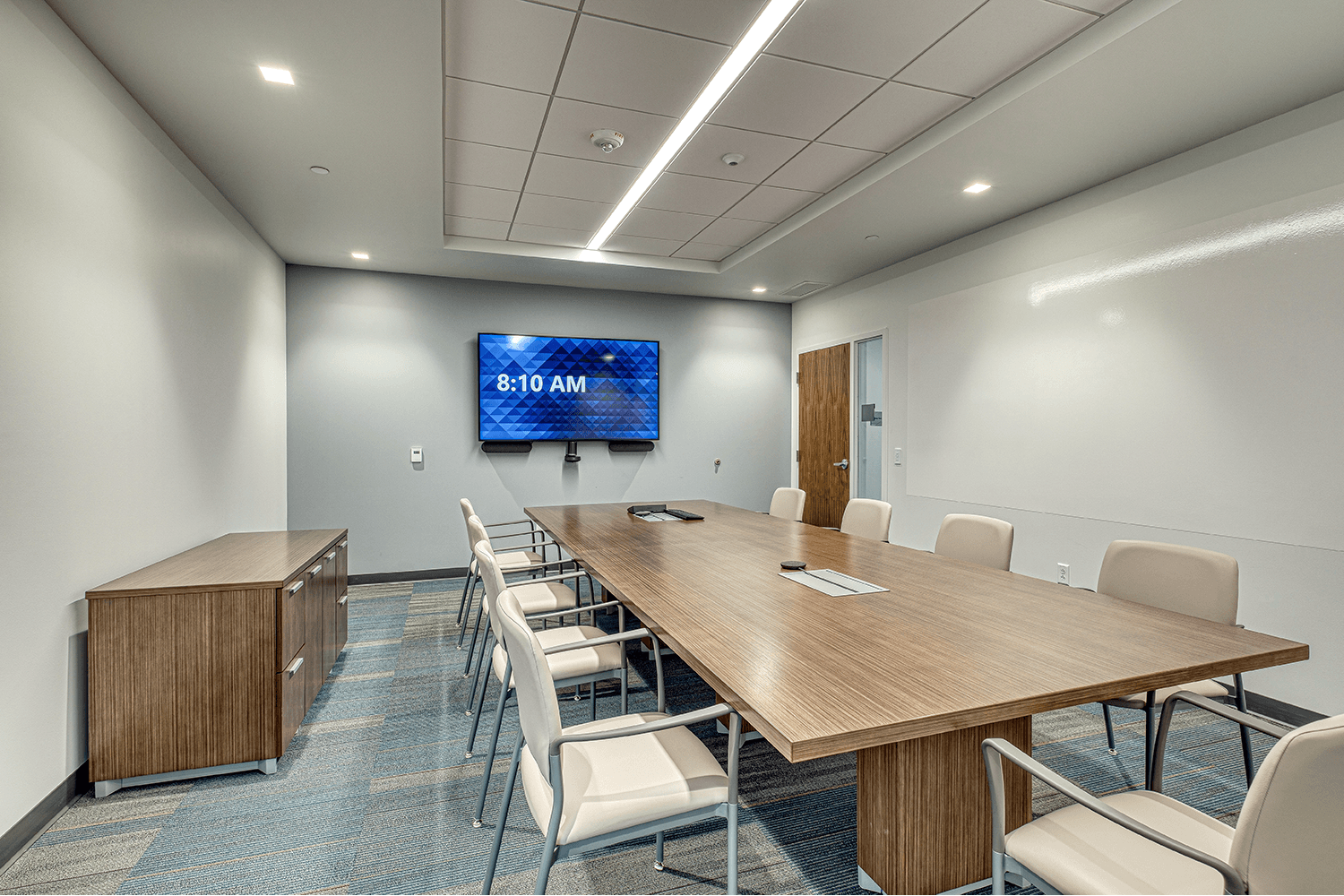 conference room with table and television