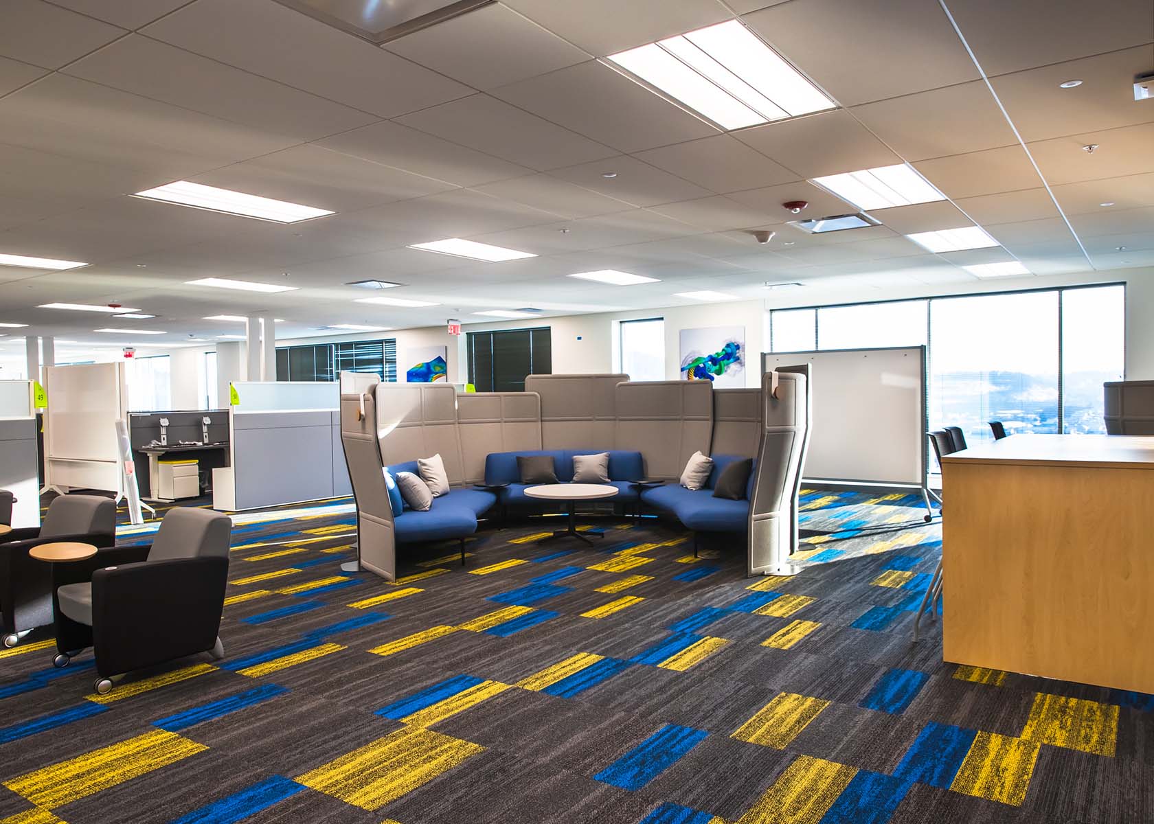 Ansys Buildout with grey, blue, and yellow carpet and modern future