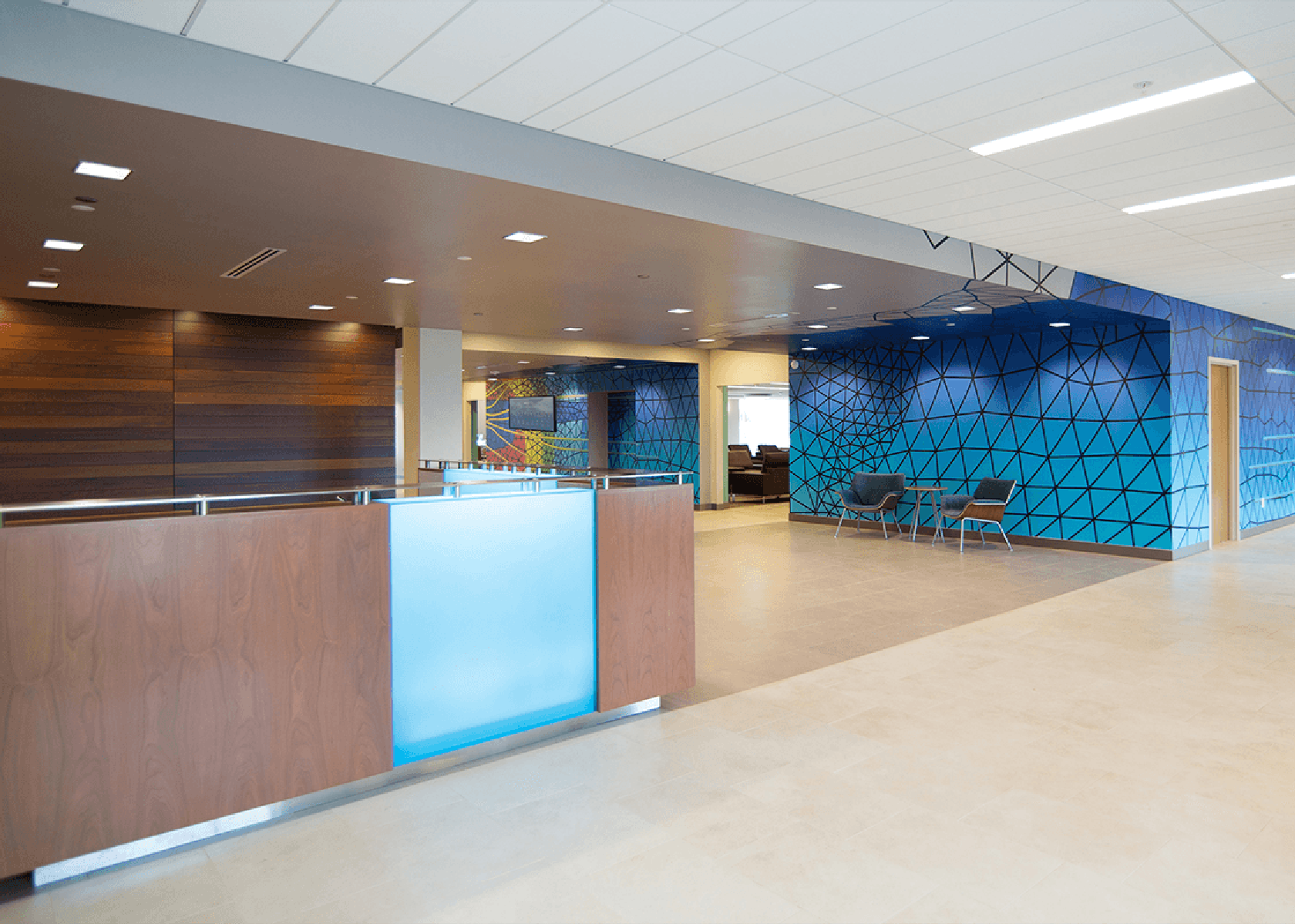 reception and lobby with geometric wall patterns
