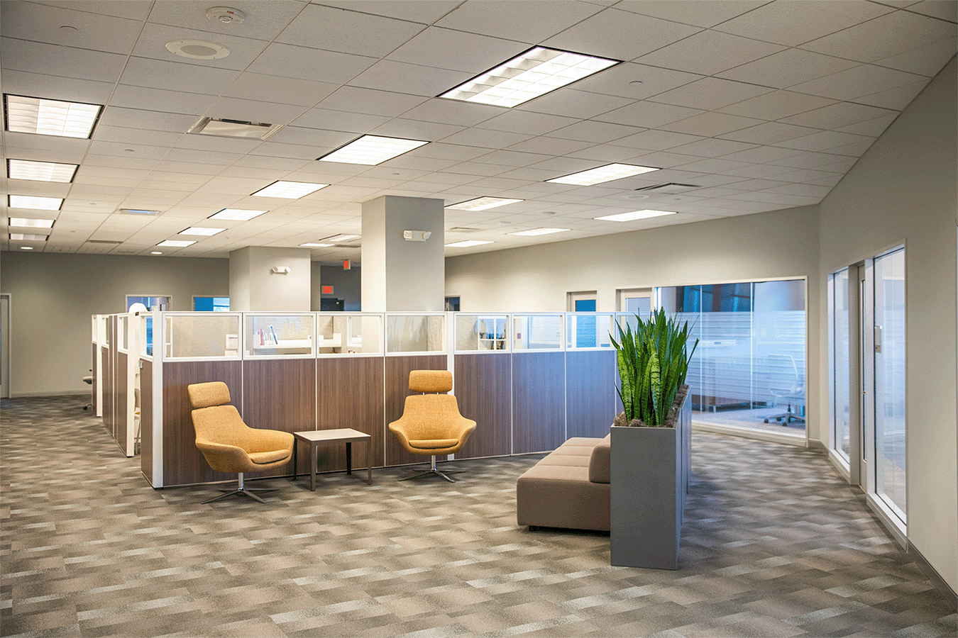 common seating area with beige lounge chairs
