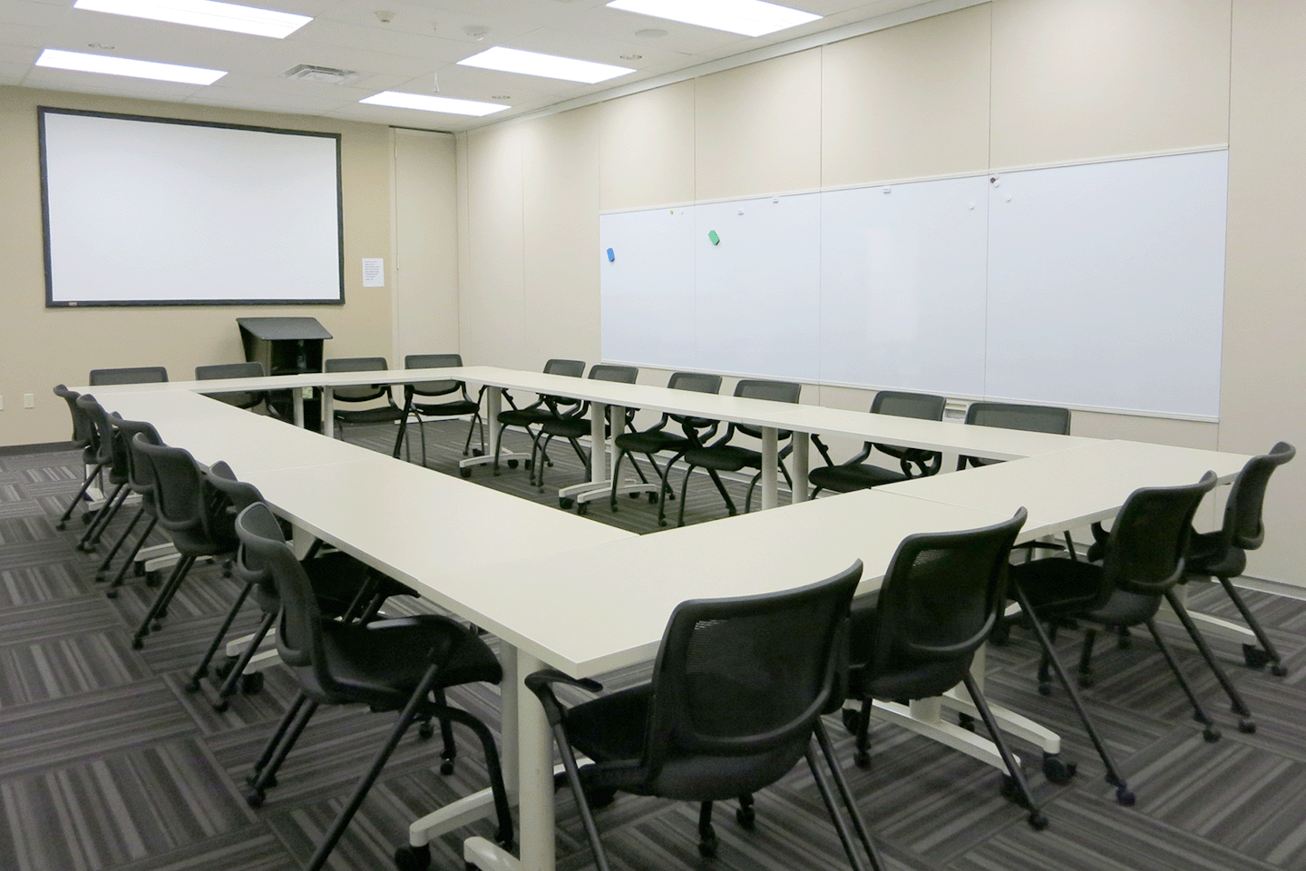 conference room with chairs seated around a round table