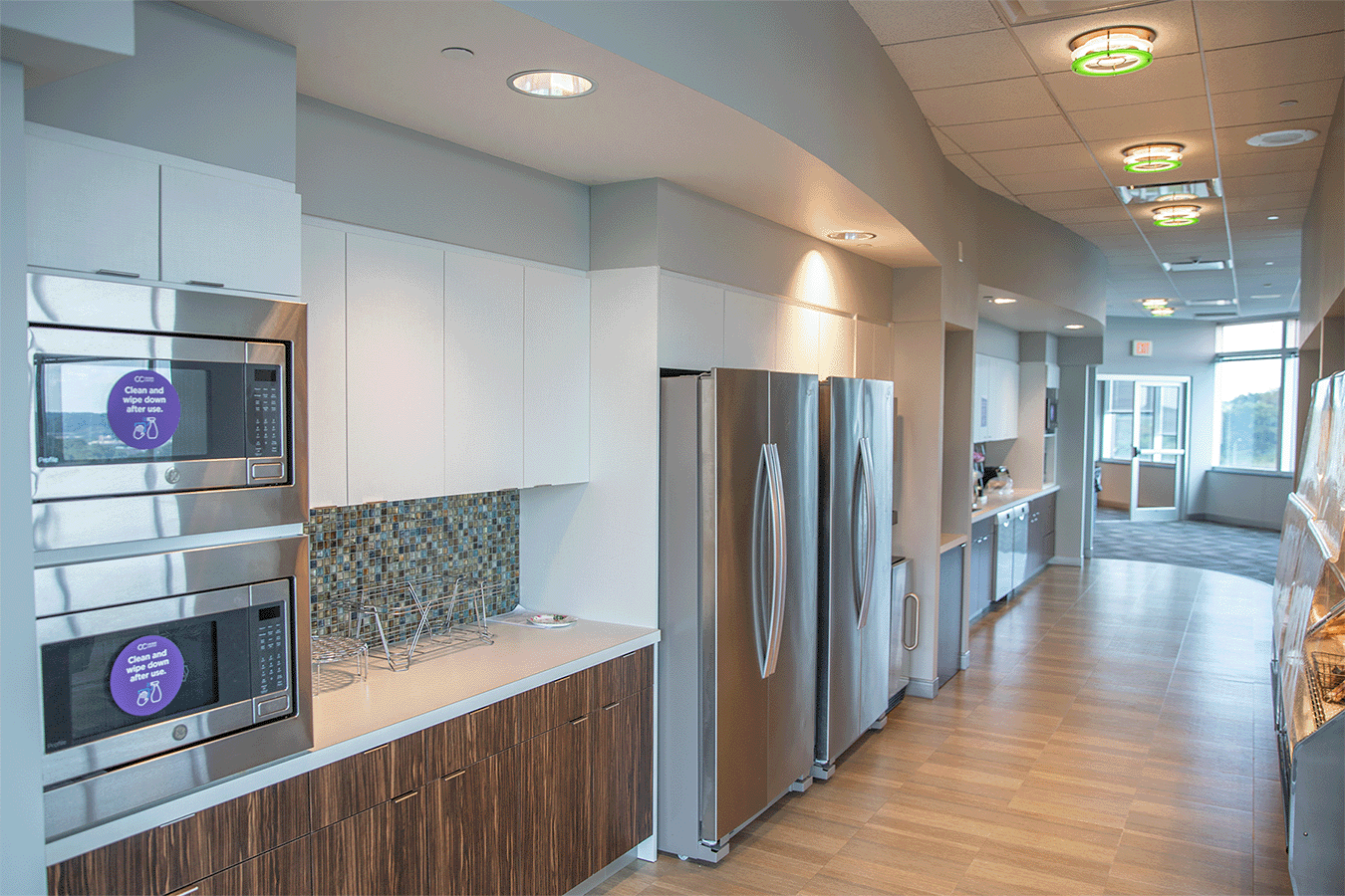 office kitchen with fridge microwaves and more