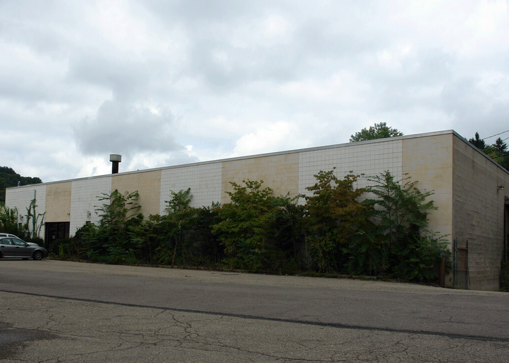 industrial white and tan building exterior