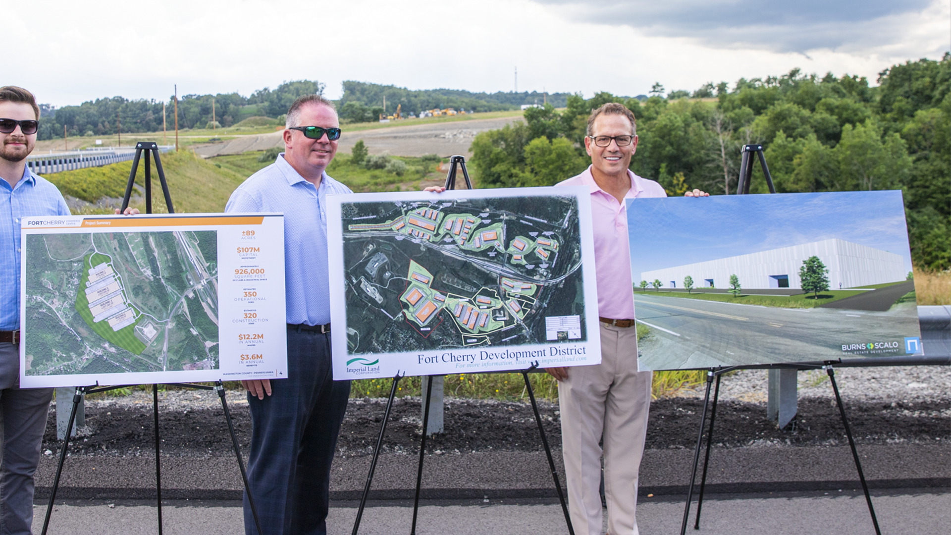three signs showing plans for new fort cherry development district